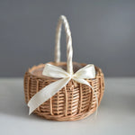 panier rotin tressé traditionnel beige clair poignée ruban blanc stockage rangement utilisation multipleDecorationFleurs