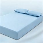 parure lit bleu clair drap housse élastique deux oreillers coton doux chambre moderne