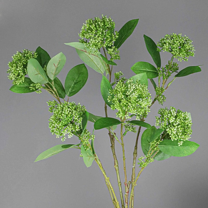bouquet artificiel feuilles vertes fleurs blanches bleues naturel extérieur arrangement anniversaire