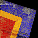 serviette table brodée motifs floraux rouge bleu jaune traditionnel élégant dorure textile décoration table