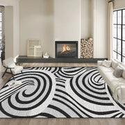 tapis moderne spirales concentriques noir blanc gris rouge salon contemporain