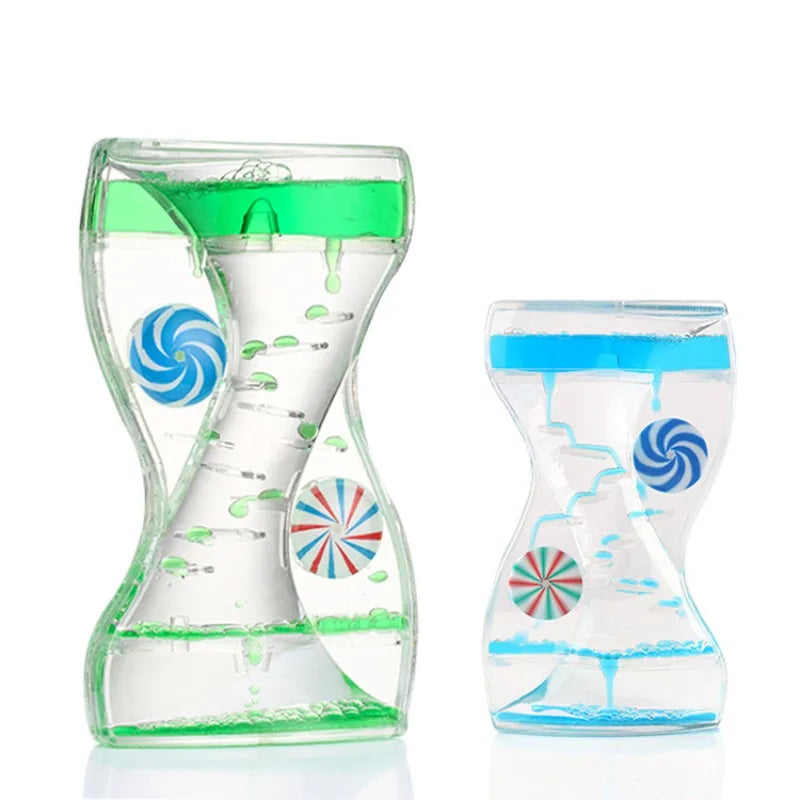 sablier liquide vert bleu transparent spirales flottantes décoration intérieure relaxante hypnotique