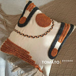 taies d'oreiller géométriques brodées boho chic couleurs beige orange gris franges respectueuses environnement decoration
