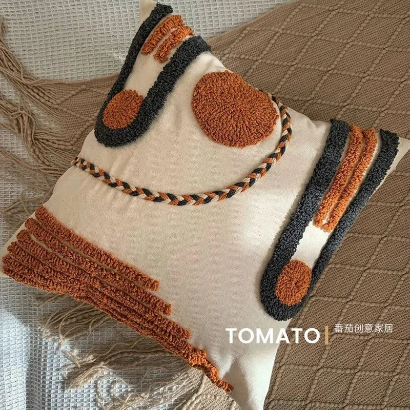 taies d'oreiller géométriques brodées boho chic couleurs beige orange gris franges respectueuses environnement decoration