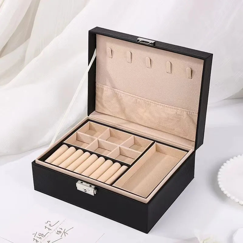 boîte bijoux simili cuir portable miroir moderne élégante poignées métalliques compartiments