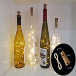 Guirlande lumineuse bouchon liège LED blanc chaud sur bouteille vin