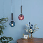 suspension lumineuse moderne transparente bleu rose gris câble fixe