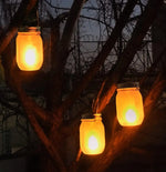 lampe solaire moderne blanc noir effet flamme étincelles vacillantes extérieur jardin mariage