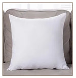 coussin brodé géométrique moderne toile coton couleur beige pompons décoratif
