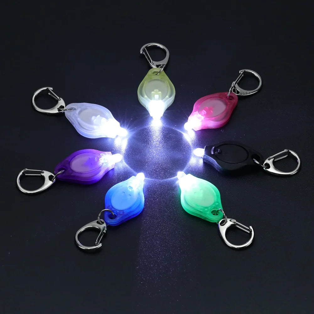 lampe torche portative led miniature ronde translucide anneau fixation sac dos