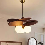 ventilateur suspendu moderne marron clair lames bois sphères translucides minimaliste