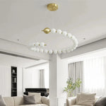 suspension lumineuse moderne blanc doré boules rondes salon chambre restaurant étude