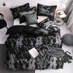 ensemble literie moderne motif marbré abstrait noir blanc pièces duvet taies d'oreiller
