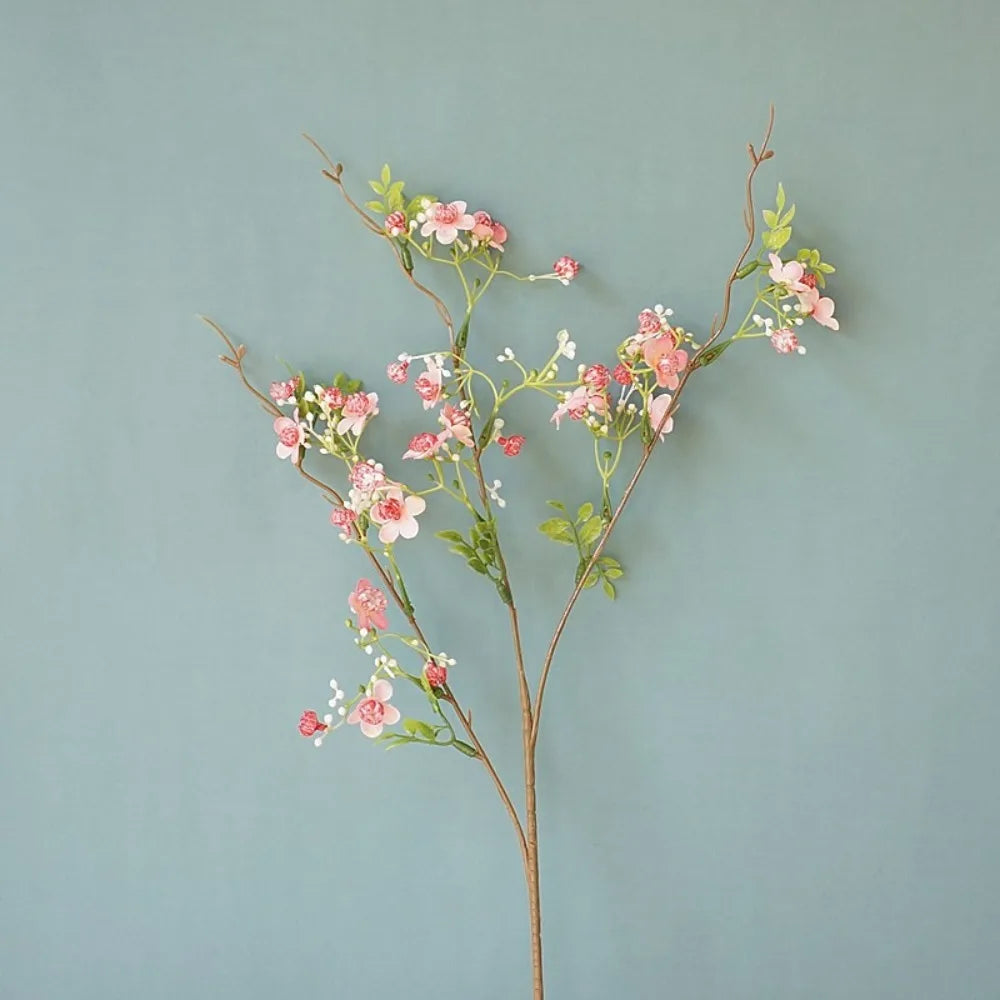 décoration intérieure fleurs artificielles soie rose blanc jaune vert branches feuilles vases transparents printemps