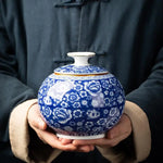 pot thé céramique bleu marine blanc fleurs dorées couvercle classique