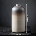 vase decoratif moderne minimaliste beige brun foncé texture grungy ombre douce decoration table fleur