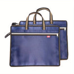 sac main moderne bleu géométrique poignées métalliques carnet stylo papier ruban