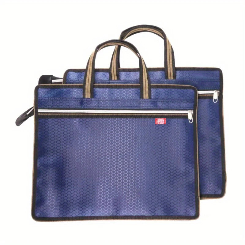 sac main moderne bleu géométrique poignées métalliques carnet stylo papier ruban