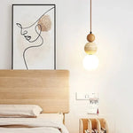 suspension lumineuse moderne pierre bois texture naturelle 3000K marron clair interrupteur bouton LED 90