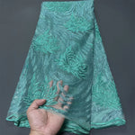 tissu brodé sequins motifs floraux polyester coton occasion mariage robe cérémonie bleu rose blanc