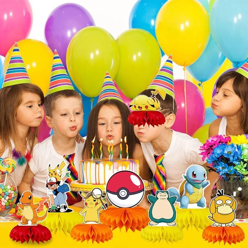 décorations table fête motifs pokémon rouge orange jaune bleu vert hexagonaux figurines pompons