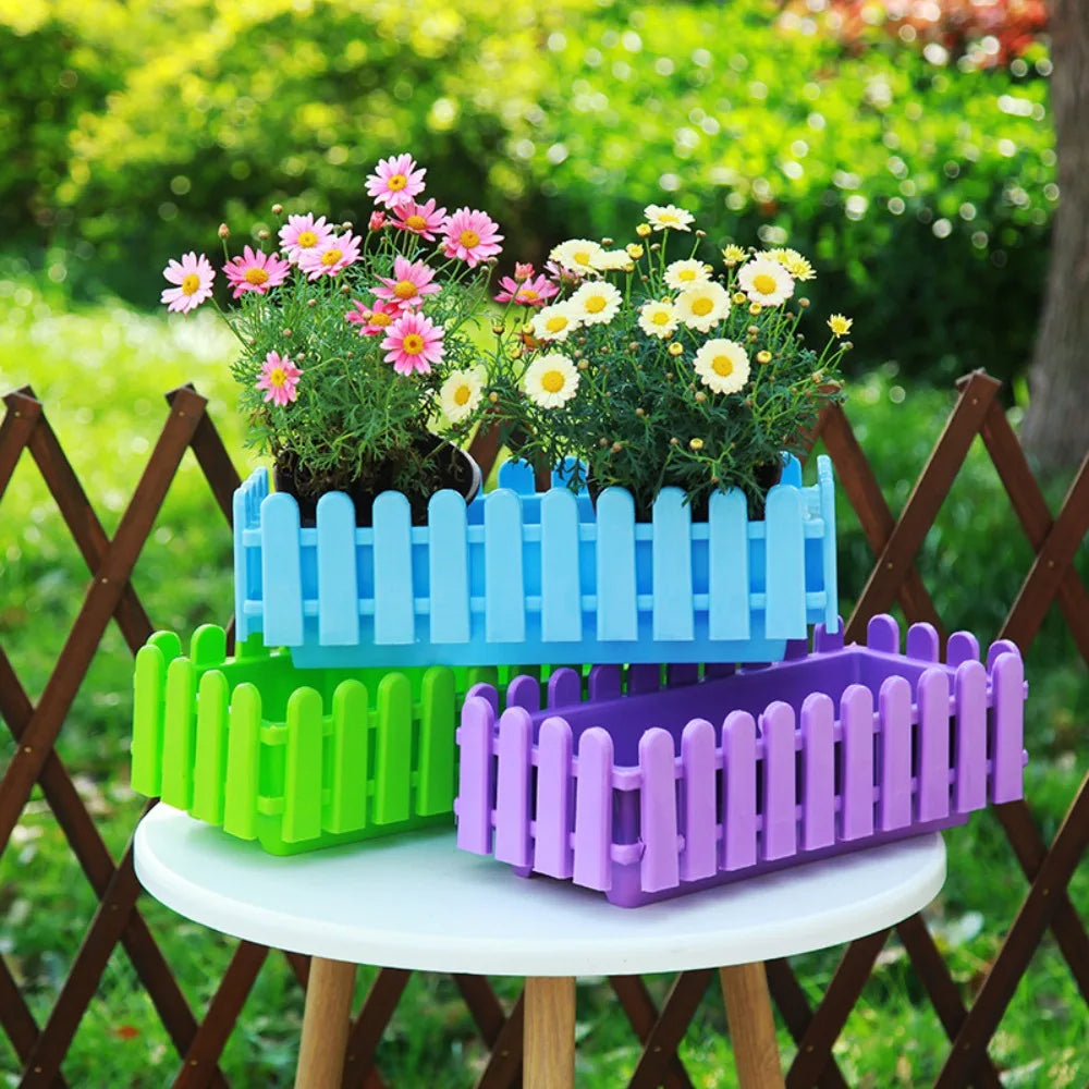 Bacs fleurs modernes cloture piquets couleurs vert bleu violet rose