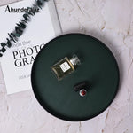 présentoir rond moderne plateau uni vert foncé orange noir maquillage soins parfums cosmétiques table