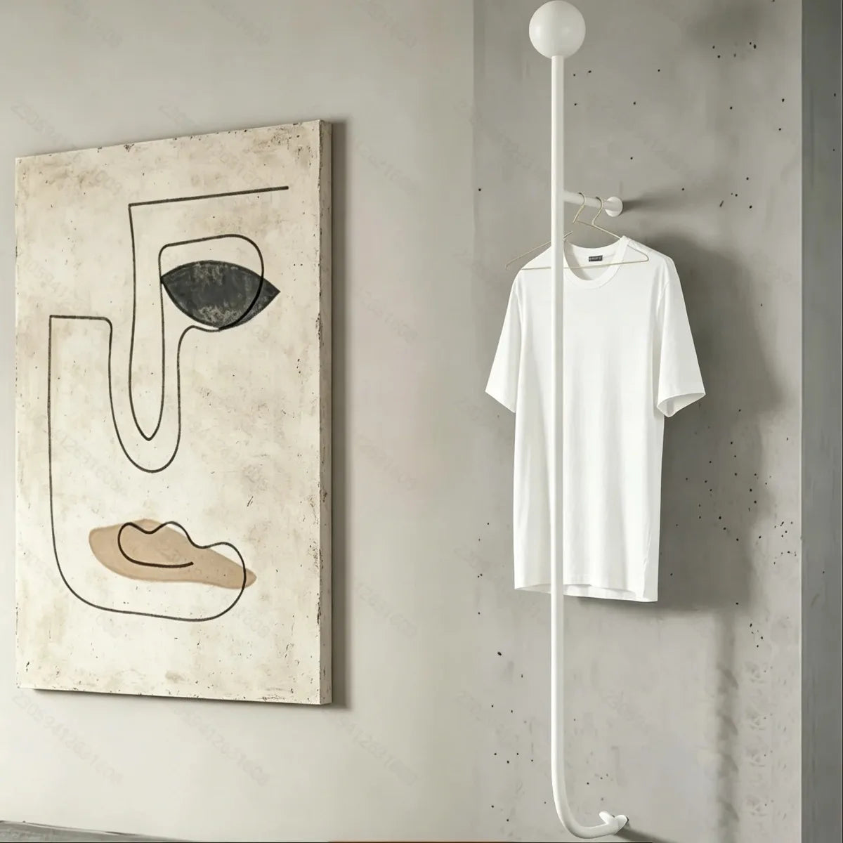 Détail des crochets du porte-manteau mural