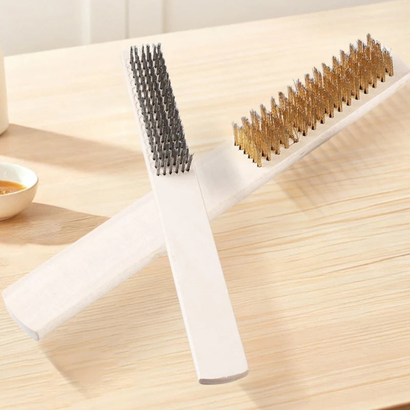 brosse nettoyer surface métallique éliminer scories saleté rouille fil acier poignée bois