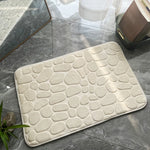 tapis bain antidérapant mousse polyester texture cailloux moderne noir gris