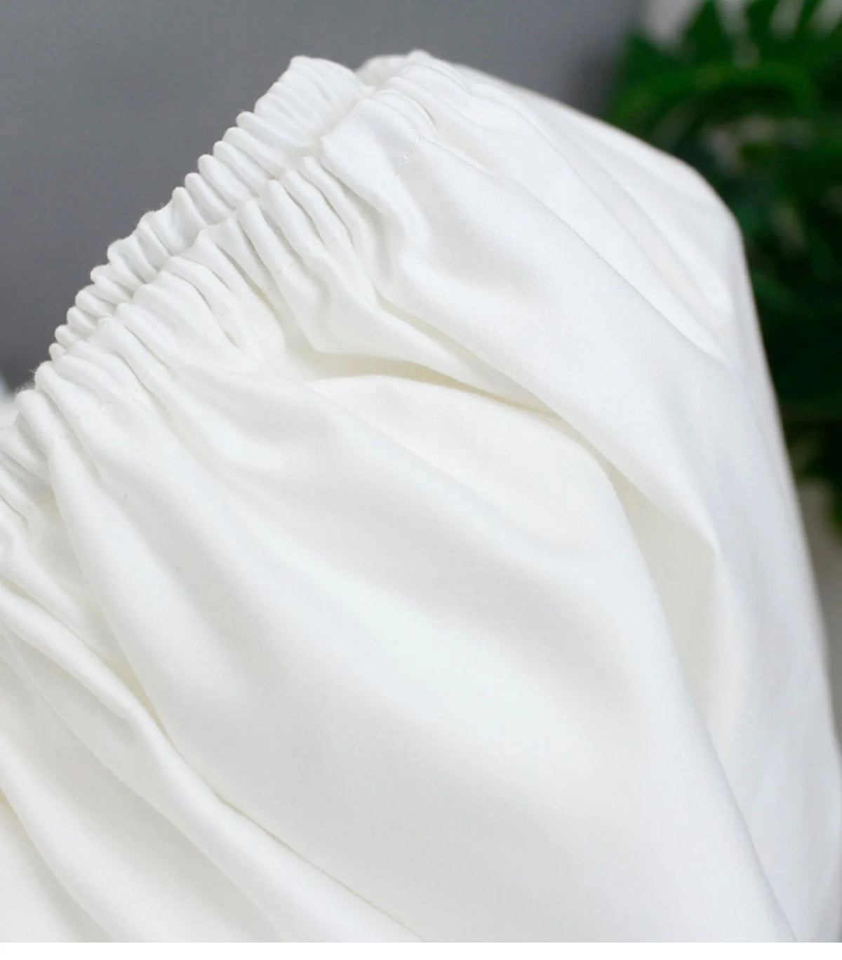 draps lit blancs satinés king size boutonnés complet moderne ecofriendly