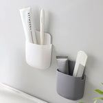 porte accessoires mural adhésif gris blanc moderne écran télécommande smartphone câble charge brosse dents