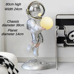 statuette astronaute résine couleur changeante doré argenté rose jaune moderne brillant métallique fixations