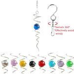 spirale métallique boule verre translucide carillon vent moderne minimaliste crochets métalliques noir bleu vert