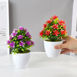 plantes artificielles bonsaï violettes rouges jaunes blanches pot blanc mousse verte décoration moderne extérieur