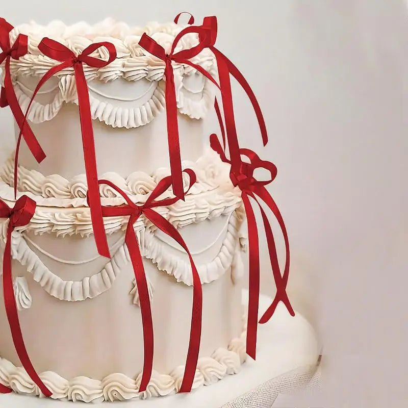 décorations gâteau forme ruban nœud noir rose rouge satin vintage élégant festif pic fixé