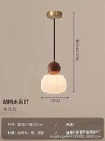 suspension lumineuse trois abatjour bois foncé blanc laiteux moderne minimaliste