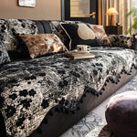 housse canapé moderne blanche taches noires pompons décoratifs protection salon tissu polyester élégant