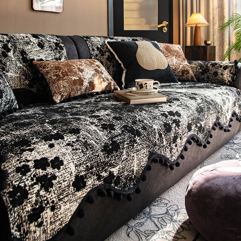 housse canapé moderne blanche taches noires pompons décoratifs protection salon tissu polyester élégant