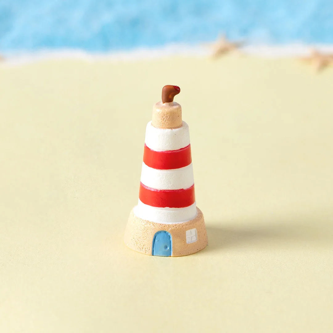 phare miniature résine pyramide blanc noir bleu rouge rayures horizontales artisanal decoratif porte fenetre