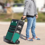 Boîte à outils ouverte montrant les tiroirs et compartiments de rangement