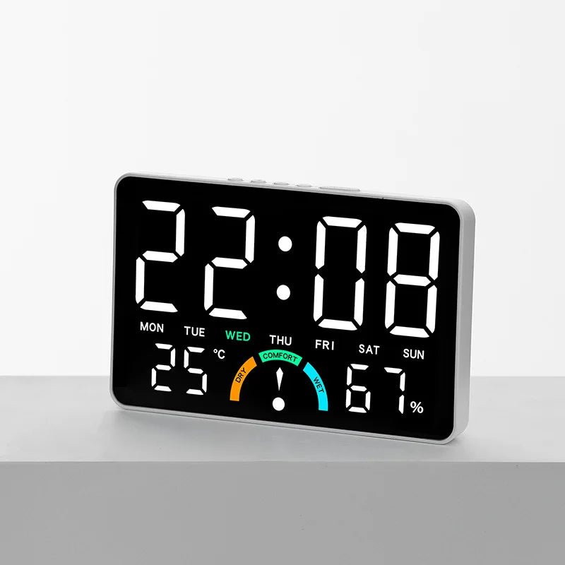 horloge numérique multifonction affiche heure température humidité jour date alarmes blanc noir vert moderne