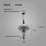 suspension lumineuse or noir contemporain minimaliste ampoule led intégrée fixation câbles métal superposé