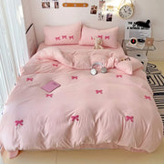 ensemble literie rose motifs nœuds relief bordure fronces liens blancs doux girly enfant
