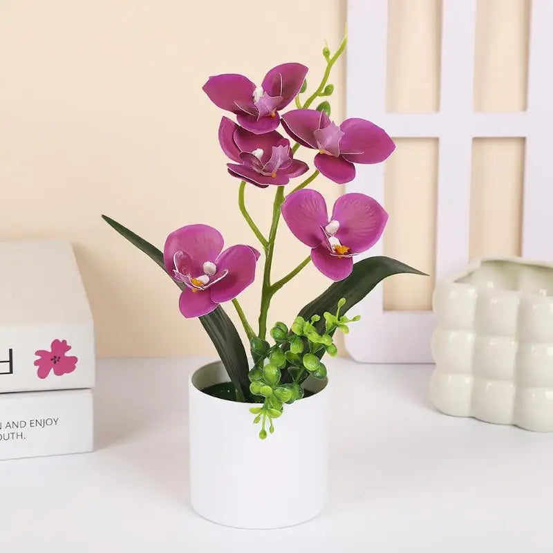 décoration intérieure orchidées artificielles pots blancs fleurs simples feuilles vertes moderne