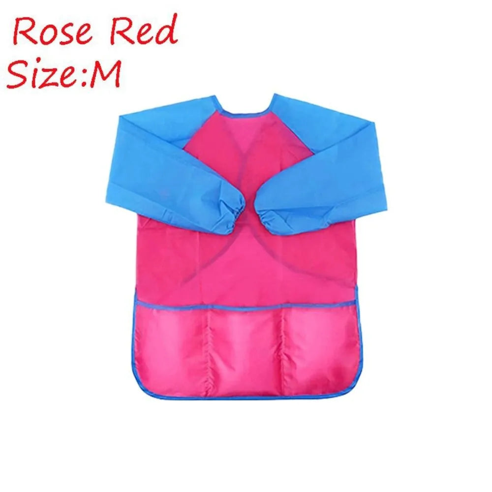tablier peinture imperméable enfant pinceaux jaune bleu rose poche élastique pratique