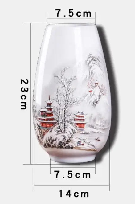 Vase en porcelaine décoré d'un paysage japonais enneigé avec des pagodes.