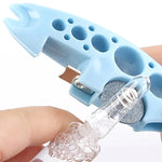 outil débouchage bouteilles bleu rose blanc texture caoutchouc perforations ergonomique vis interchangeable