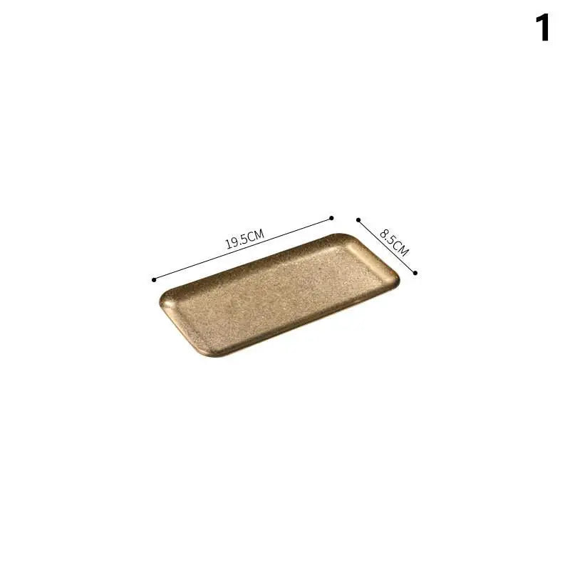 assiettes dorées modernes brillantes métal minimaliste grandes petites