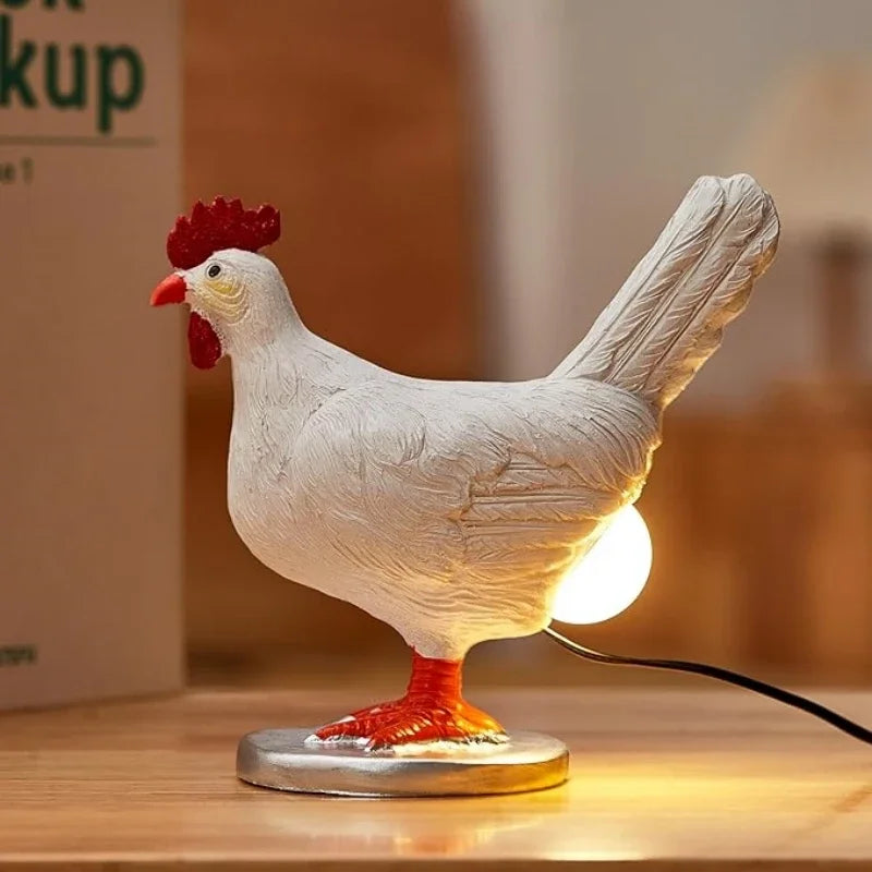 lampe décorative moderne poule blanc rouge détails sculptés chambre coucher